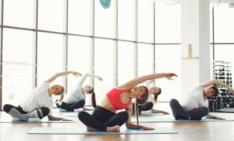 Dynamic Harmony: 4 Person Yoga Poses for Group Wellness